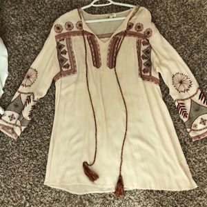 Cream dress with detailing